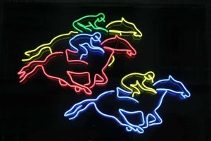 a neon sign for horse racing in vienna, austria